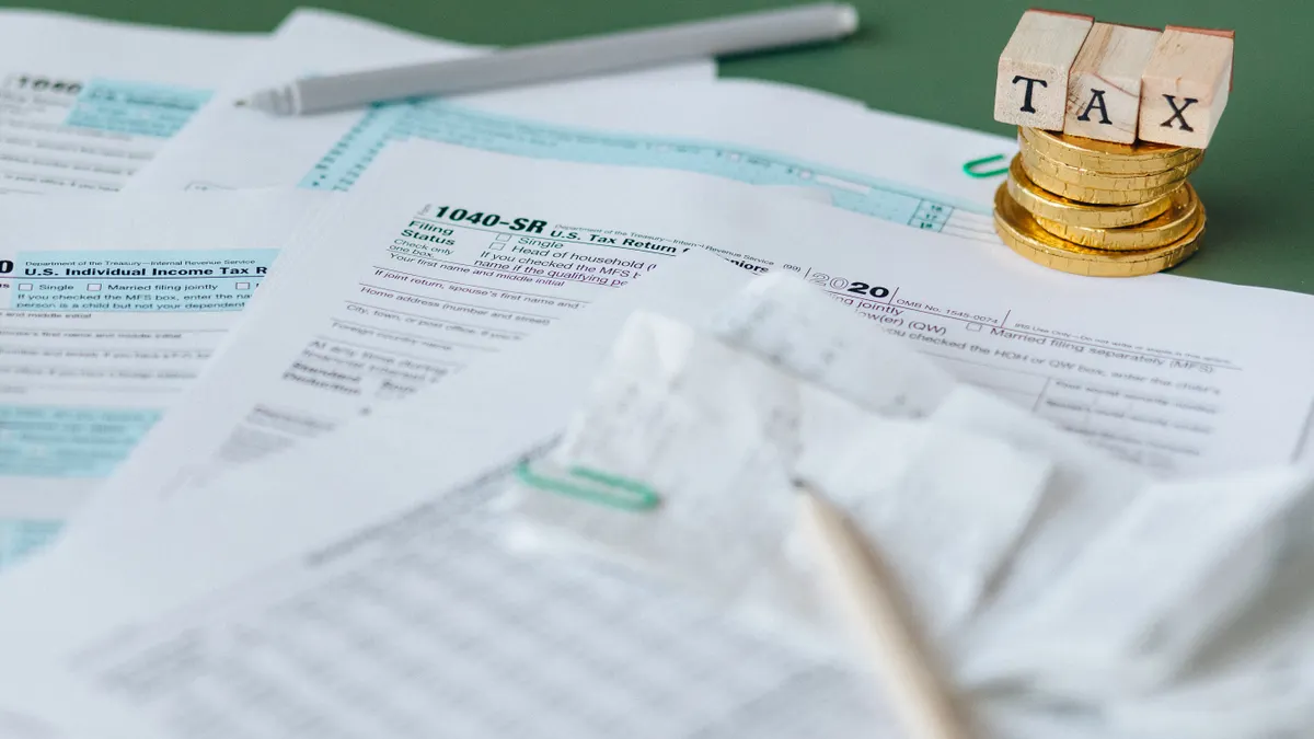 Tax forms with a small TAX block stack